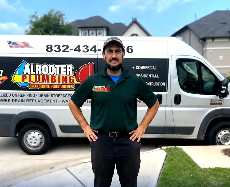 AL Rooter standing in front of his AL Rooter Plumbing service van